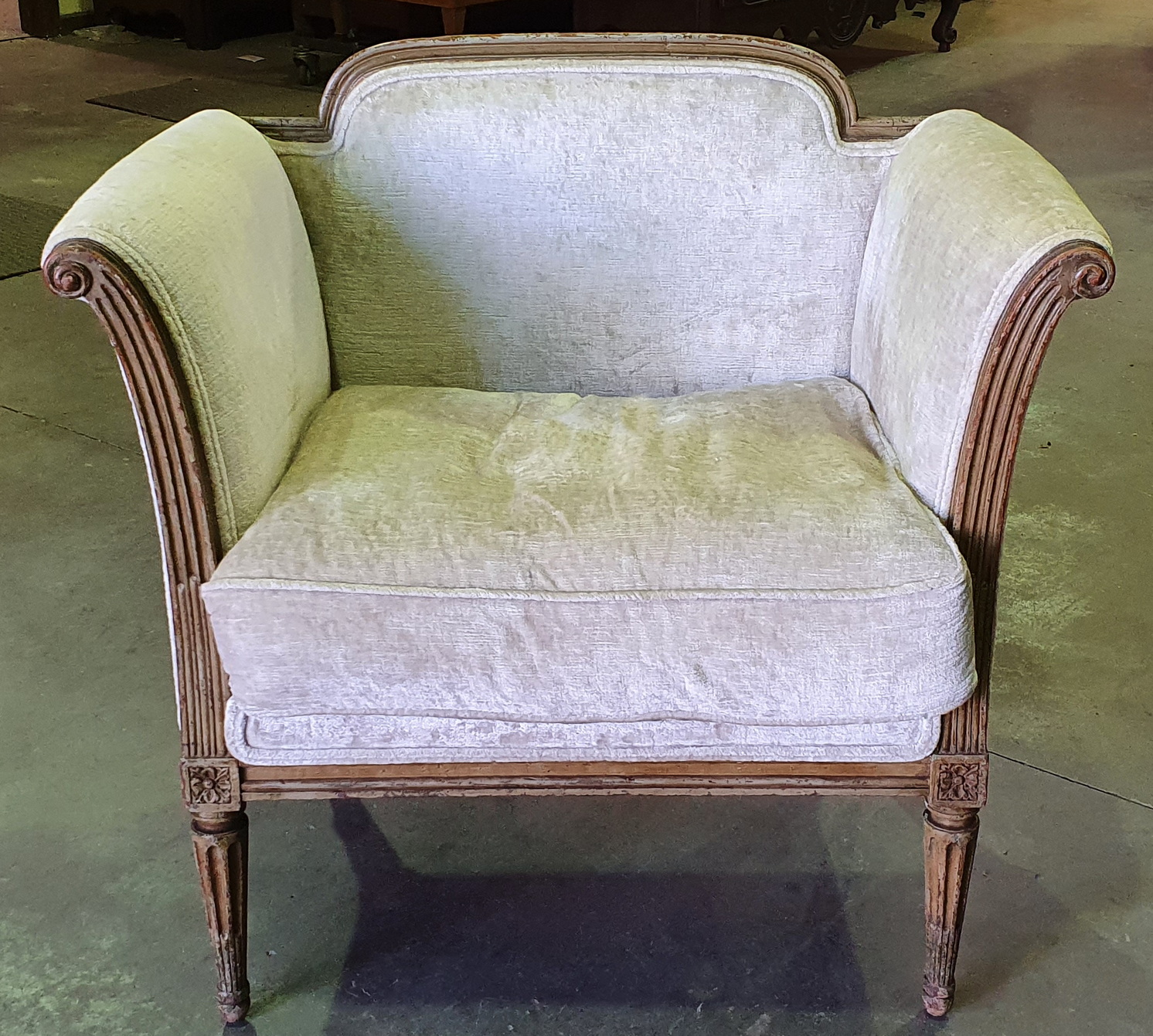 A pair of French 'En Bateau' Armchairs